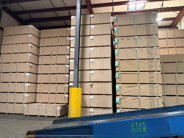 Finished panels banded and stacked on the floor awaiting shipment